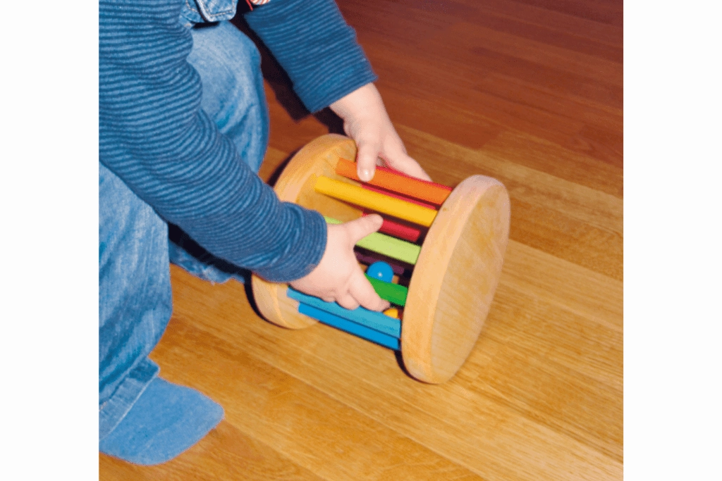 Grimm's Giant Rolling Wheel With Wooden Beads and Bells